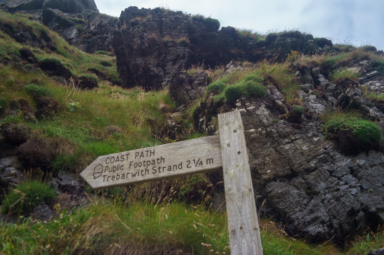 A Coast Path marker at Tintagel